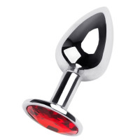 Маленькая коническая серебристая анальная пробка с красным кристаллом - 7 см. Маленькая коническая серебристая анальная пробка с красным кристаллом - 7 см.