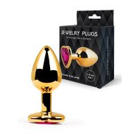 Золотистая анальная пробка с малиновым кристаллом - 9 см. Золотистая анальная пробка с малиновым кристаллом - 9 см.