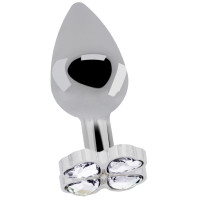 Серебристая анальная пробка с прозрачными кристаллами в форме клевера - 9,5 см. Серебристая анальная пробка с прозрачными кристаллами в форме клевера - 9,5 см.